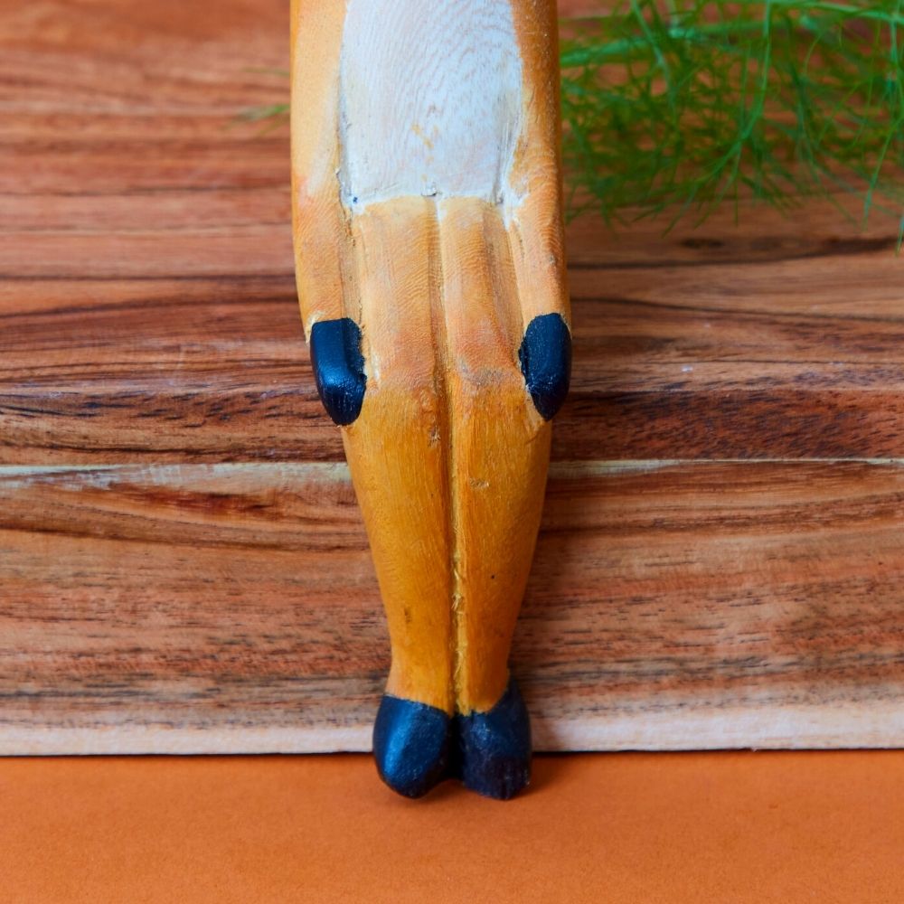 Painted Wood Sitting Antelope Sculpture